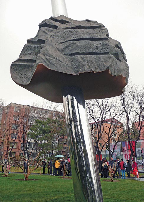 Carved by Jon in 2010, the cloud in “Cloud and Rain” is actually a synthetic mix of cement, fiber, and resin, and is quite durable. At 15 feet tall, 5 feet wide and 10 feet deep, Cloud and Rain stands in Wanshu Park, Xuanwu District, Beijing, China.