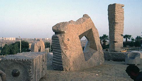 “Aswan Sync and Tsung Tubes” was carved in 2002 out of Aswan Granite and sits at the Aswan International Sculpture Park, Aswan, Egypt. It stands 11 feet high, 12 feet wide, and is 4 feet deep. The hole was cut out using a jack hammer, according to Jon.