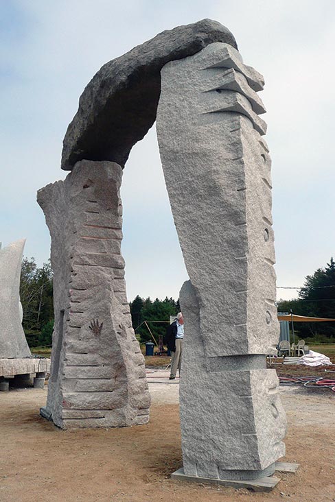 Portals and Education was the theme for the public art piece carved by Jon at the 2011 Schoodic International Sculpture Symposium, Prospect Harbor, Maine. “Sublime Portal: Whispering Stones” stands 14 ft. tall, 14 ft. wide and 4 ft deep, placed at City Hall Park, Hancock, ME at completion. 