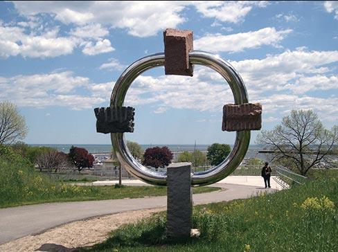 Commissioned for the Brady Street Bridge Project in Milwaukee, Wisconsin, “Compass” was carved in 2005 and is made of stainless steel and 4 different granites. Inspired by the Lakota Sioux story of the “Finding of the Four Directions of the Compass,” it stands 12 feet tall, 10 feet wide and 3 feet deep. 