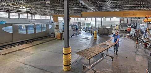 A three-axis crane facilitates safe and efficient movement of fabricated components, while a Sasso Meccanica linear edge polisher, Brembana CNC and dust collection system maintain a high level of productivity and a clean environment for the company’s craftsmen. 