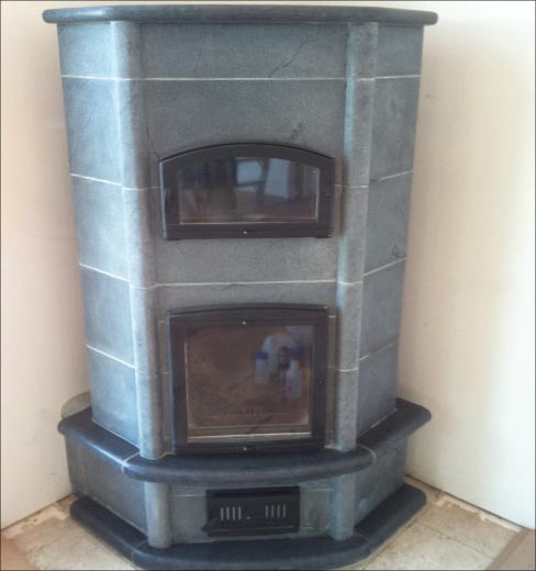 Two examples of soapstone masonry stoves. “Soap stone is pretty interesting in that it has an amazing ability to store, transfer and radiate heat. From a thermal performance standpoint, it is an ideal material,” Jason Temple said.