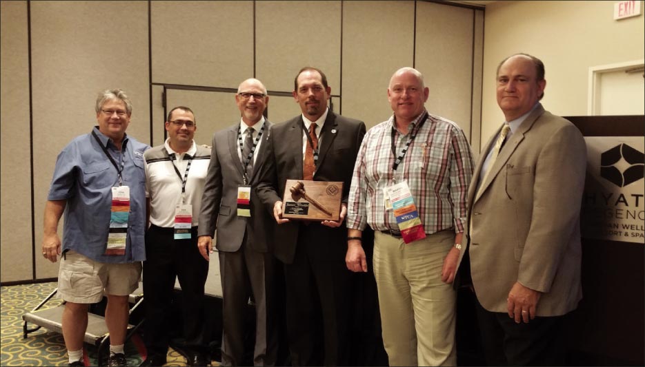 Left to right: board advisors John Cox and Dan Welch, incoming President Martin Howard, outgoing President James Woelfel, incoming 2nd Vice President Martin Brookes, and incoming 1st Vice President Chris Walker. 