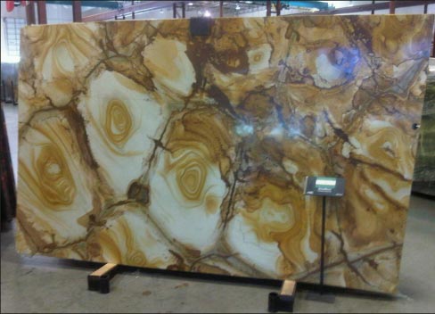 Although Ricciardi does take on commercial and multi-unit jobs, the bulk of Countertop Rock’s work is in home remodels. Exotic stone like Galaxy Black and the Stone Wood Onyx slab shown above are still in high demand with his customers, but the average cost for granite has gone down, he says. “It’s become more accessible, more affordable.”