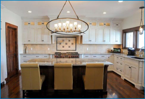 This kitchen features a Bianco Romano countertop which truly reflects all the natural sunlight from the surrounding landscape.