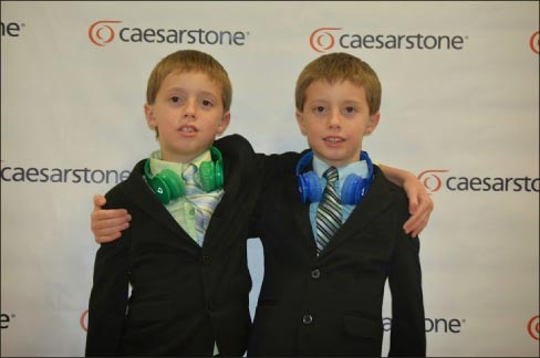 From left, Brian III and Bryce Brutting “help” at a recent Caesarstone seminar.