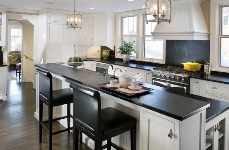 Soapstone backsplash by The Woodshop of Avon