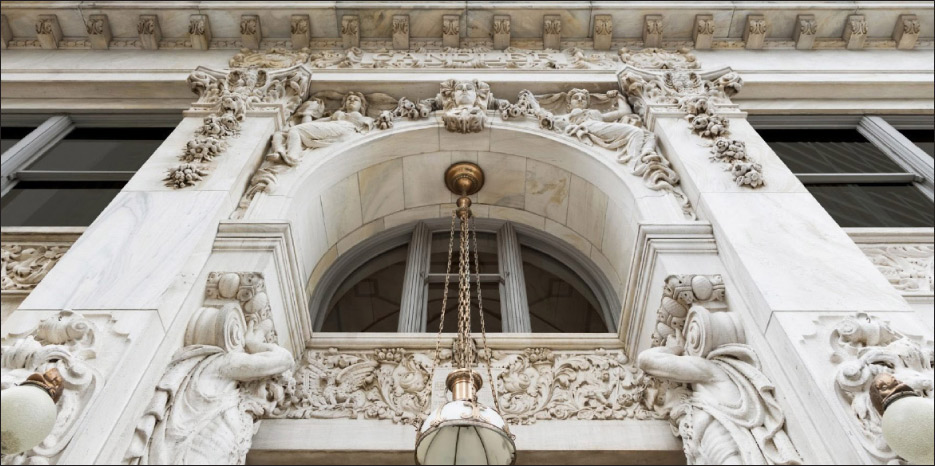 The neoclassical Candler Building front entrance façade.