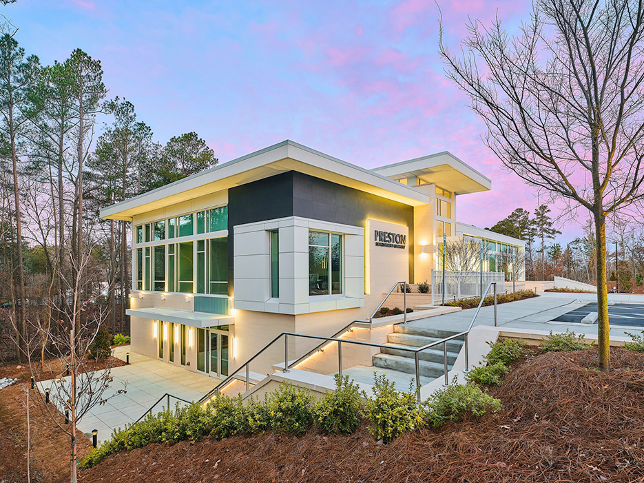 Offices of Preston Development. This large-scale project involved exterior cladding and interior design elements, including wall cladding, and a curved reception desk in the lobby, other stone accents.