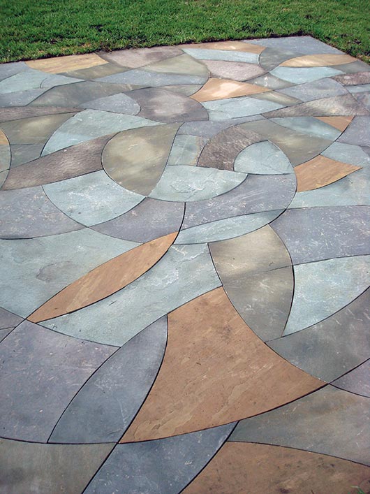 Blue Spiral is a 225 square foot stone mosaic patio