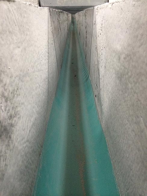 Inside a Megamax Insta-Pour Trench, showing the sloping, smooth radius of the bottom and sides. Although the Megamax trench has been offered since 2005, the newest refinements were introduced in 2013.	 