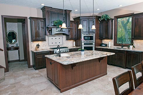 The custom cabinetry, built-in designs housing baking ovens and the refrigerator, and the first-rate installation are hallmarks of the quality of design and product that Sims-Lohman delivers to its customers. 