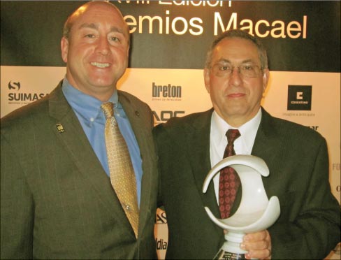 (Left to Right) Tony Malisani and David Castellucci proudly hold the “Institution Award” at the Macael Awards event.