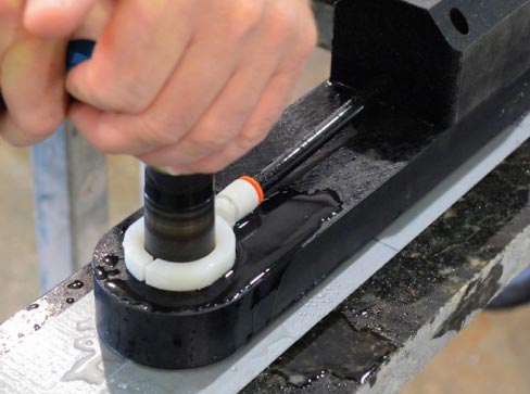 3) Simply drill the hole completely through, allowing the template guide to keep your bit straight and centered. All the water, mess, dust, etc. gets pulled in by the shop vac. – reducing your on-site cleanup.