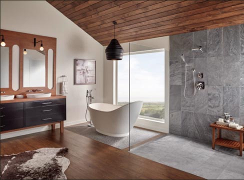 Montauk Black Slate large format tiles are an elegant focus in this open plan bath.