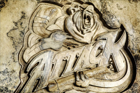 Deep bas-relief carving in a block of Algonquin limestone, for the Owen Sound Attack hockey club shows the typical earth tones and grain variations found in this beautiful stone.