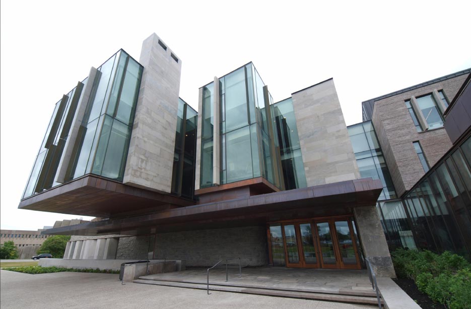 The Richard Ivey School of Business in uses several different varieties of limestone from Ledgerock: Honed Algonquin panels on the higher levels/floors; Splitface Wiarton Grey Ledgerock (4-inch bed width); and Algonquin Crust Face panels can be seen under the right side of the copper entrance overhang. 