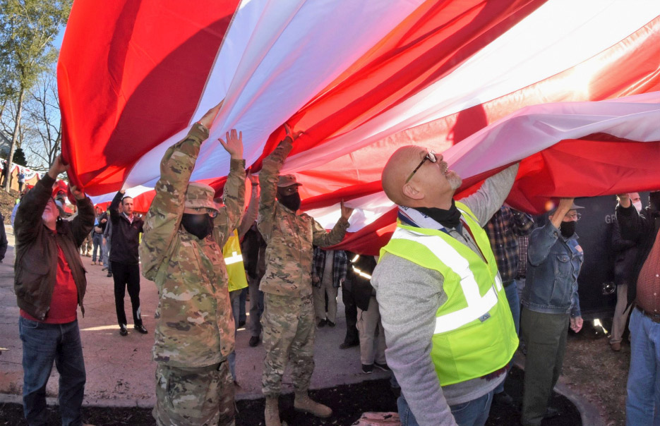 Over 1,500 people, including 300 veterans and active-duty U.S. soldiers turned out for the celebration.