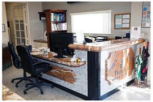 inviting Rainforest Brown multilevel reception area at Triple D Marble and Granite