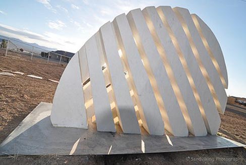 Carved from Carrara marble, “Suncrest” stands 7 feet tall x 11 feet wide and 24 inches deep.  Carved in 2007, it is the second piece of his “Light & Shadow” Series,  and was permanently installed at the Olympic Park in Park City, Utah immediately before the 2002 Olympic Games began.