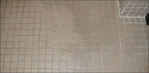 Porcelain tile with failed wax application