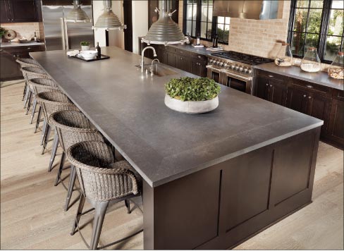 Metropolis Grey quartz (island and counters) is often specified to give residential kitchens a modern, urban-industrial look update.