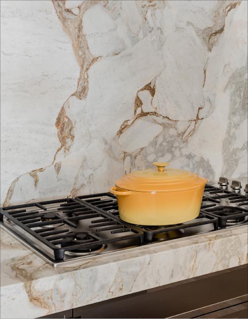 United Marble Fabricators was awarded the 2016 Kitchen of the Year for this project. One focal point of the room is this beautiful, flowing expanse of marble backsplash.