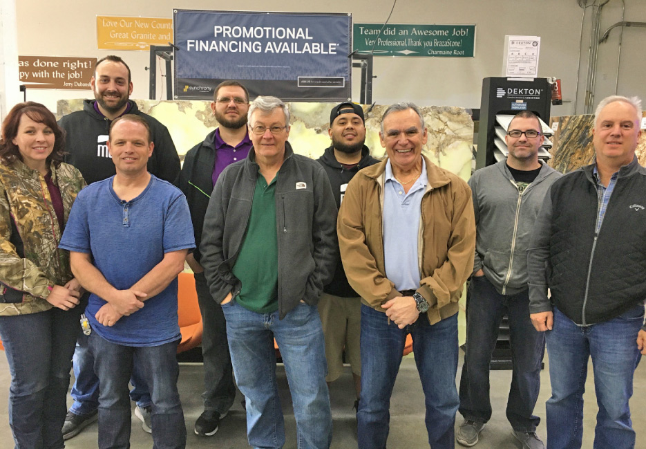 Dr. Fred stands at center left, with the January 2020 Workshop class.