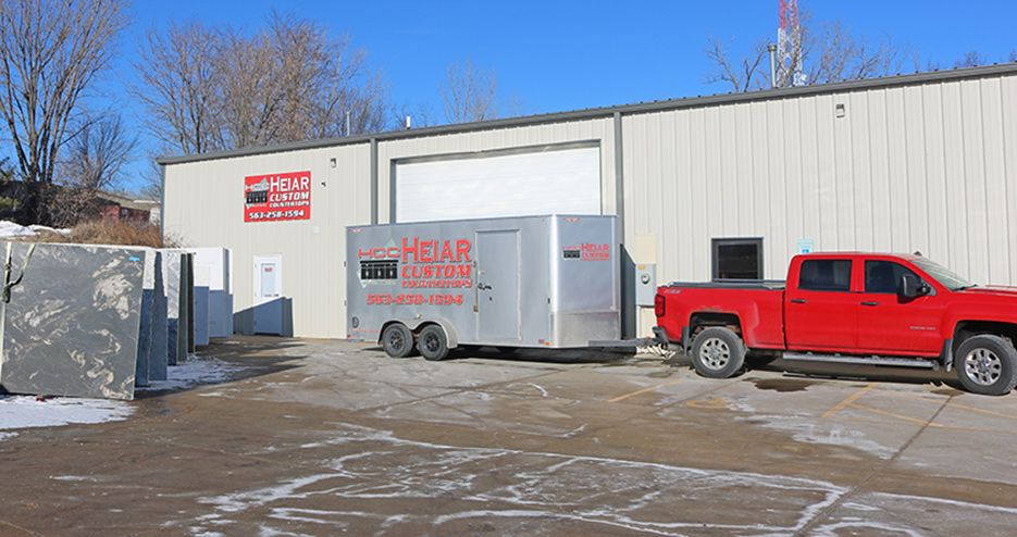 Their trailer is set up for safe transport and slab offload, and holds all the equipment needed for a full install.