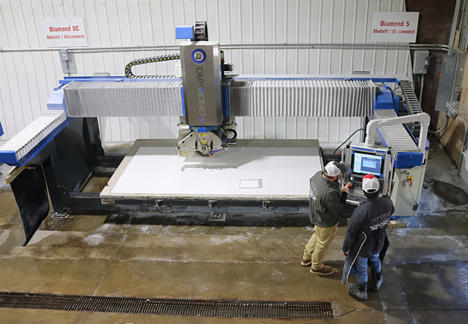 Jeff and Isaiah program the MTE CNC 5-Axis bridge saw