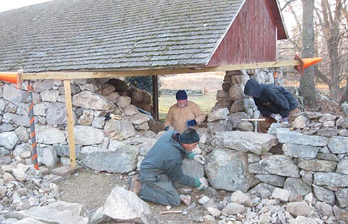 DSC masons rebuild a stone barn in 2010 at the Weir Farm, CT National Historic Site