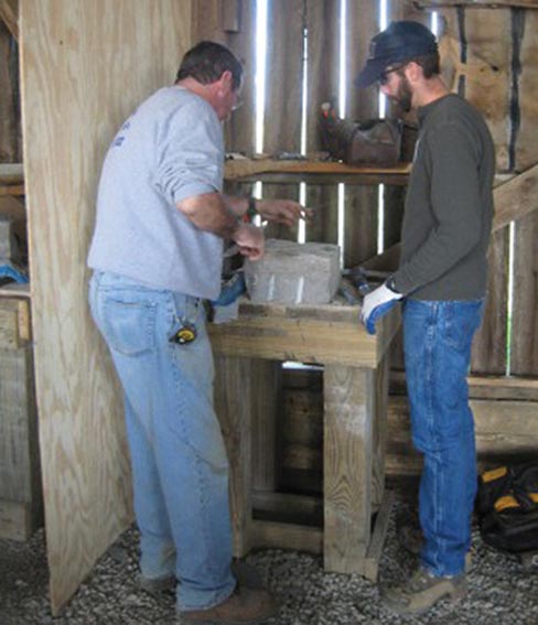 Wilmore Culvert project. The wood forms are called “centering” or “falsework.” The culvert was at a slight angle to the road, so the centering extends a bit beyond the face. Both vaults are laid-up at the same time, then the centering is removed, leaving a self-supporting arch.