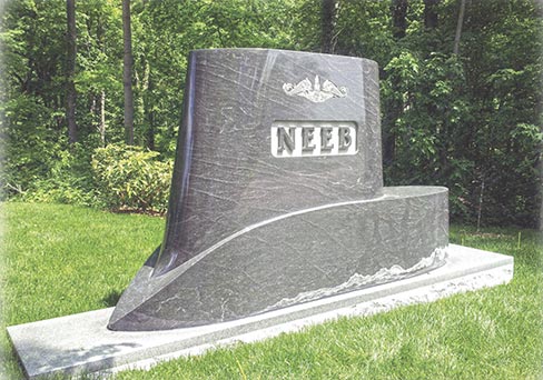 The Neeb monument illustrates how visions can be turned into reality. The submarine is fabricated from a solid piece of Rock of Ages Black Mist granite which measures 11´-6˝ x 6´-6˝. The sub rests on a 16´-0 Sealmark Rock of Ages Blue Gray base. Spring Grove Cemetery and Arboretum provides the setting for this story in stone.