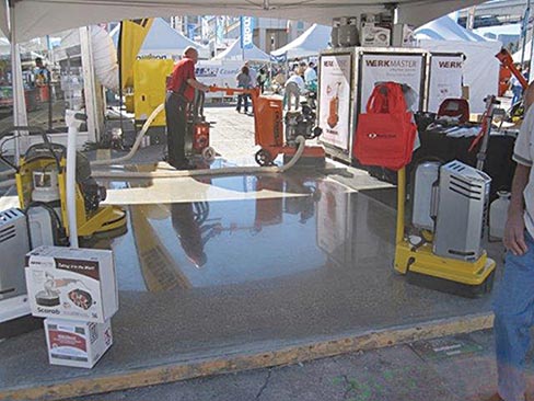 This year, WerkMaster introduced their XT series of grinder/polishers with XT updates to the Termite, Viper and the Colossos. XT stands for Xtra Torque. The demo slabs were challenging to polish, with all the accelerators and polymers. Some manufacturers ground wet, some dry, while others used both a wet/dry process. Some enhanced the shine of their floors chemically by using sealers and burnishers, while others – including WerkMaster – delivered a true mechanical polish.