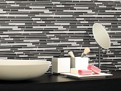 Offered in six striking color blends: Brick, Durango, Fawn, Haystack, Sky and Smoke, Stix mosaics are mesh-mounted on 11˝ x 14.5˝ sheets. Actual tiles are 3/8˝ wide x multiple lengths.