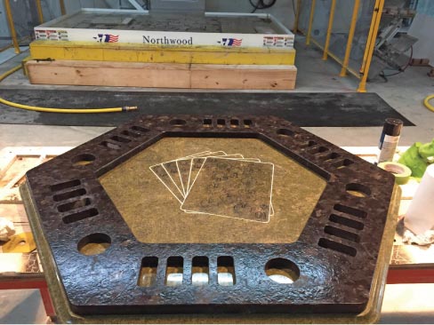 Check out this amazing card table made with the Robotic SawJet at the Northwood Training Center (cigars and scotch are optional, gentlemen). The Northwood Robotic SawJet does glass (not tempered) and metal, too. 