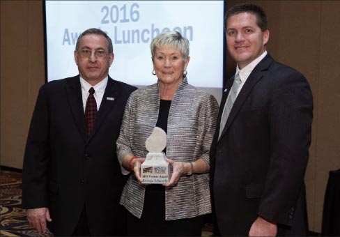 Brenda Edwards with 2016 MIA President David Castellucci  and 2016 BSI President Aaron Hicken. 