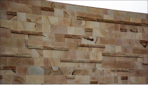 This wall at the Blue Ash Summit Park incorporates a sawed veneer with a cropped, split face rubble to give the wall a rich color variation and also a nice depth and reveal.