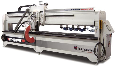 The Park Industries Pro-Edge was introduced in 1992.  The Pro- Edge was not the first “C” frame machine on the market, but Park was the first to make one that reliably produced several toroidal edges with precision, and it revolutionized edge shaping and speed in the shop. The Pro-Edge IV is the latest and greatest.