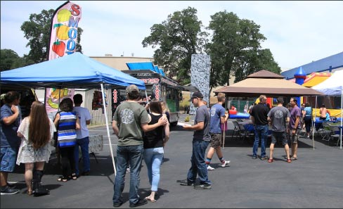 Employee appreciation picnic complete with rock wall, bounce house, and taco truck!