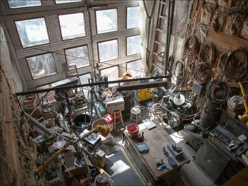 This overhead photo of Andreas’ shop shows an eclectic collection of tools and machines, and speaks volumes of his life and legacy of creation. “Ever since I was little I liked engines and machinery, and still do.”