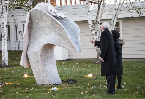 Now the cornerstone of Acadia Hospital, Maine artist Andreas von Huene’s Zephyr is unveiled by Hospital President and CEO Dan Coffey and Max Kagan Family Foundation representative Leslie Kagan.          