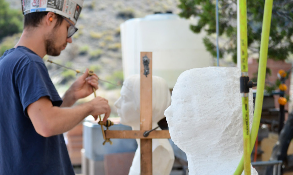 Morgan Dummitt uses the pointing machine during the 2018 workshop.