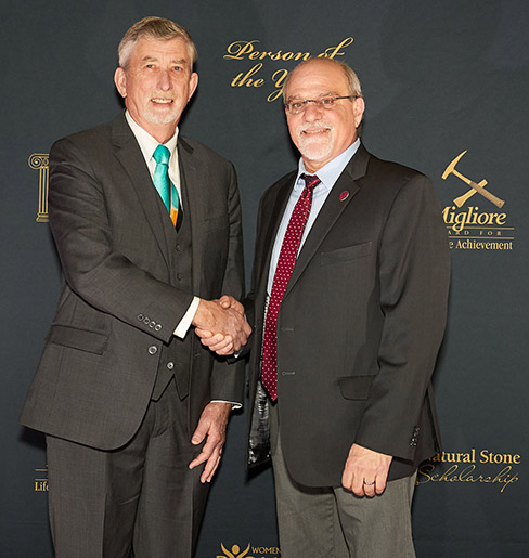 Timothy Johnston (left) receives the 2022 Craftsman of the Year Award