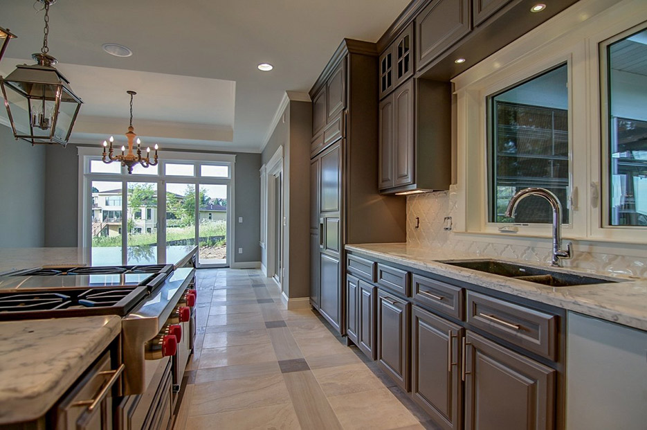 Viatera Rococo Quartz kitchen fabricated and installed for a Premier Builders high-end residential development.