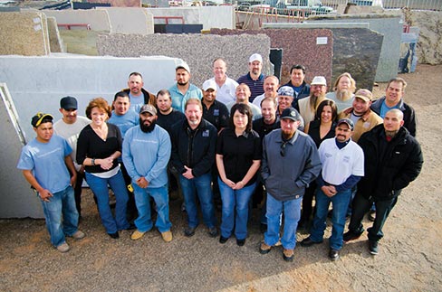 The full Rocky Mountain Stone staff. At first, they were primarily a building stone and landscape material supplier.  Always one to look to the future, the company jumped on favorable circumstances in 1978 to purchase a travertine quarry and further gain the travertine rights to several other area properties. 