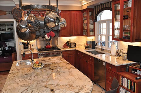 This 3cm Copenhagen granite kitchen was “bought,” not “sold.” This distinction drives the company’s first claim to fame. Most of Artistic Stone Design’s installations are also completed in one day; the company’s second claim to fame. “When I’m at the client’s home, I spend fifty percent of the time taking measurements, and the other fifty percent is talking to the client, and here again, setting those expectations while not selling,” explained ASD owner Jon Rathke.