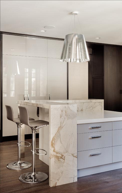 “This remarkably clean, crisp, modern gourmet kitchen is a celebration of functional design and stunning aesthetics.”