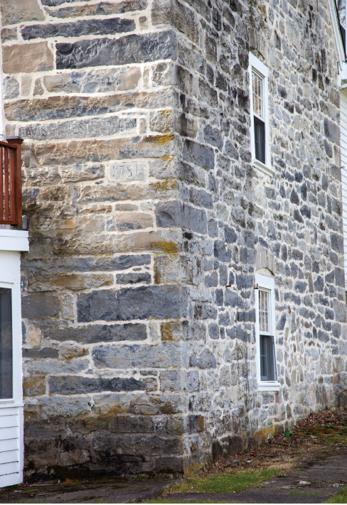 Most Moravian-built structures can be identified by the signature brick arches above the windows and the cut and placement of the cornerstones. The limestone quarry was under a mile away and the limestone blocks were delivered by draft horses and wagon. Mortar was made at the kiln with a mixture of ground limestone and locally dug clay.