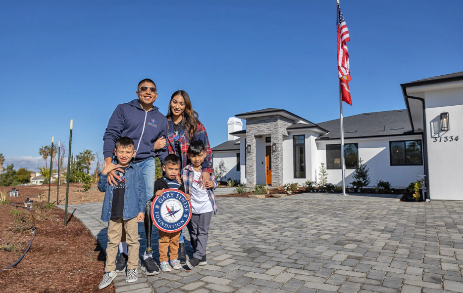 USMC Corporal (Ret.) Josue Barron, his family, and their new smart home.